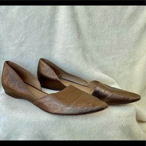 Naturalized bronze flats! Size 8. Good condition, some noticeable scuffs.